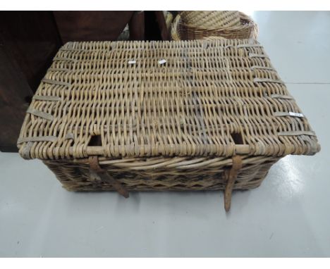 A traditional wicker travel hamper 