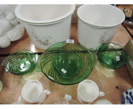 A selection of vintage green glass desert bowls with twist design