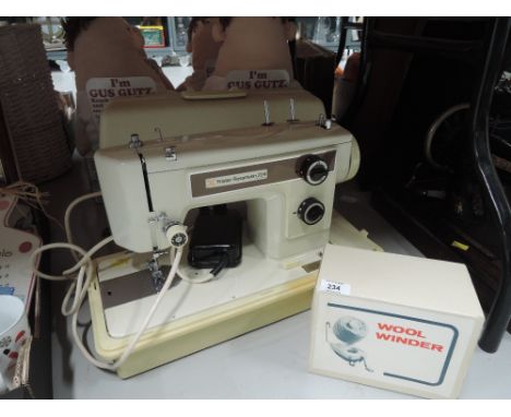 A vintage Fister Rossmann sewing machine 204