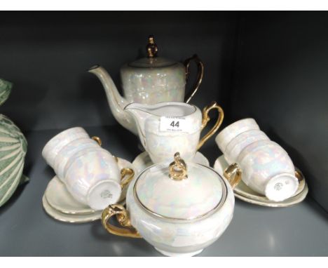 A vintage coffee service with lustre glaze