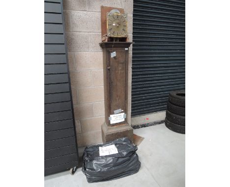 A long case clock having 30 hour movement, brass face named Luke Wise, Reading, in rustic stained case