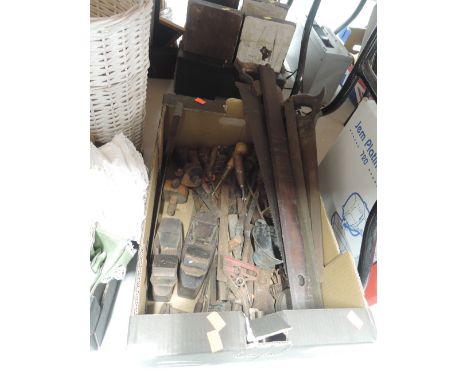 A selection of vintage woodworkers tools including chisels block plane etc