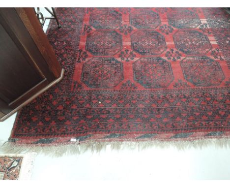 A vintage Afghan carpet square