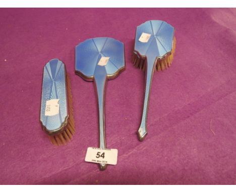 A vintage dressing table set with blue enamel backed finish