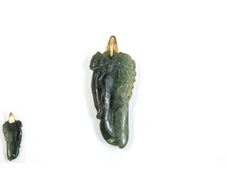 A Vintage - Nice Quality Jade Pendant In The Form of a Squirrel / Field Mouse, Raised on a Large Pod with 9ct Gold Mount. 1.5
