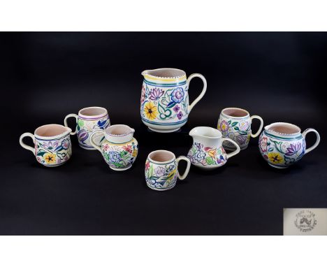 A Good Collection of Poole Pottery Jugs ( 8 ) In Total, From The 1950's. All Designed by Trudi Carter, Mostly L. E. Pattern a