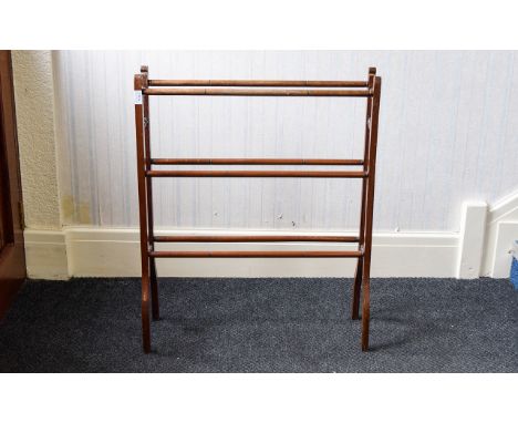 Vintage Clothes Horse Turned wood three bar clothes drier with aged patina.