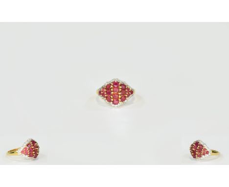 Ruby and White Topaz Cluster Ring, oval and round cut rubies set in a scalloped diamond shape, across the finger, with a fram