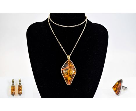 A Vintage Set of Silver and Amber Set Jewellery ( 4 ) Pieces In Total. Comprises A Silver and Amber Set Pendant and Chain. 24