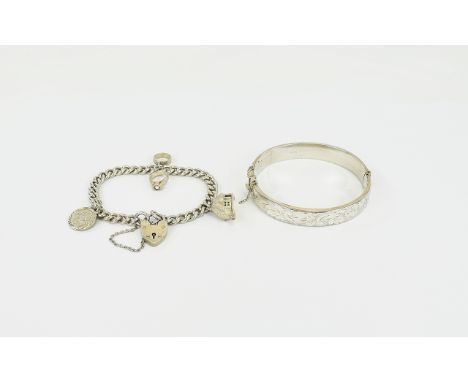 Silver Charm Bracelet Together With A Hinged Bangle