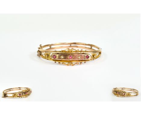 Edwardian Ornate and Attractive 9ct Gold Hinged Bangle Set with Rubies and Diamonds and Safety Chain. Hallmark Birmingham 190