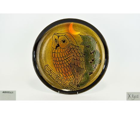 A Poole Aegean Owl Charger A large earthenware charger with handpainted owl design set against a foliate and berry background