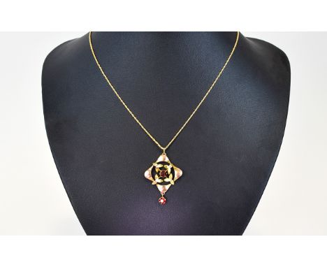 9ct Gold Edwardian Pendant Openwork Design, Central Round Ruby Coloured Stone Between Stylised Leaves And A Further Stone Set
