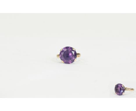 Ladies 9ct Gold - Large Amethyst Set Dress Ring. The Amethyst of Excellent Colour and Clarity. Est 8 cts. 