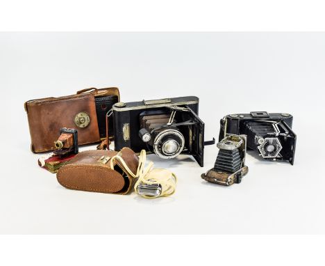 Collection Of Vintage Cameras And Photo Ephemera Approx six items in total to include three small vintage camera ornaments, T