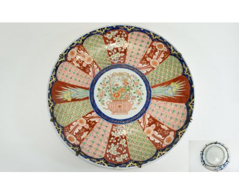 Japanese 19 th Century - Large Circular Shaped Imari Charger / Dish of Shallow Form, Decorated In Coloured Enamels Showing a 