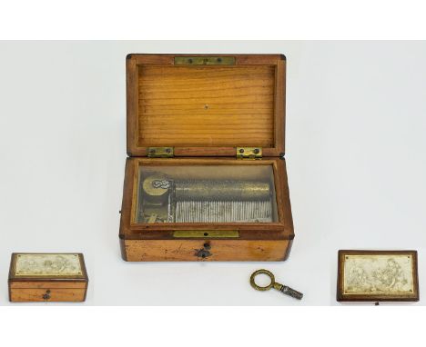 A Miniature Music Box, 5 x 3.1/4 x 2 Inches, Contained In a Mahogany Case. The Cylinder Movement In Working Order, Top of Box