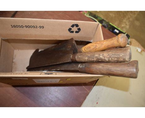 Three vintage hand tools, beet cutters etc 