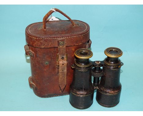 A pair of WWI field glasses, the eyepieces marked LEMAIRE FABT PARIS, in leather case stamped with broad arrow and G Battle.1