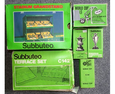 Subbuteo, three boxed trophies: C118, C119 and C128, a C142 Terrace Set, C140 Grandstand and C130 goals, (all boxed). 