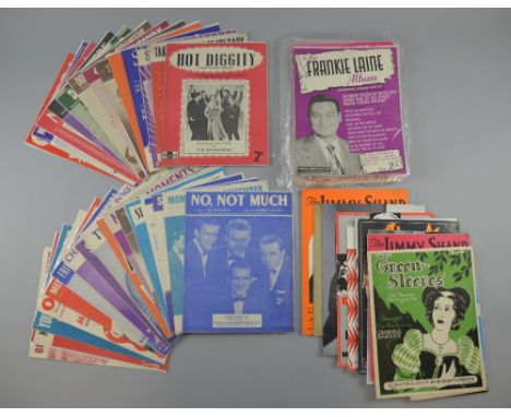 Collection of sheet music including Green-Sleeves, Frankie Laine, Blondie, Cilla Black, The Hollies, Frankie Vaughn, Al Marti