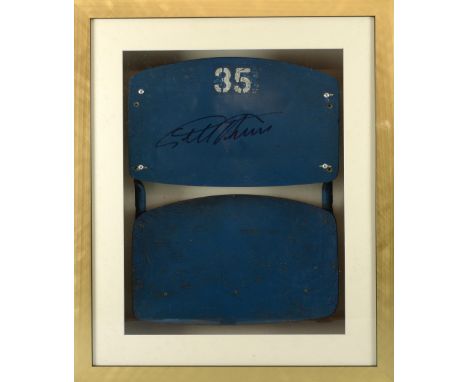 An Old Wembley Stadium seat, numbered '35', signed by England Football goalscorer Geoff Hurst, framed in mounted display, wit