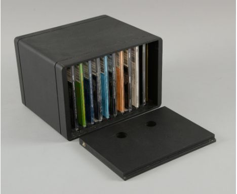 Oasis, First Nine Singles in a custom made wood amplifier box with an interview CD and 2 booklets, includes the original rele