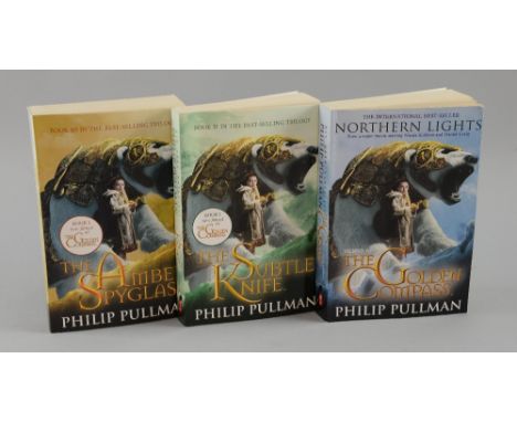 The Golden Compass, Three books signed by the author Philip Pullman (3).Provenance: This lot has been consigned by Duncan Hal