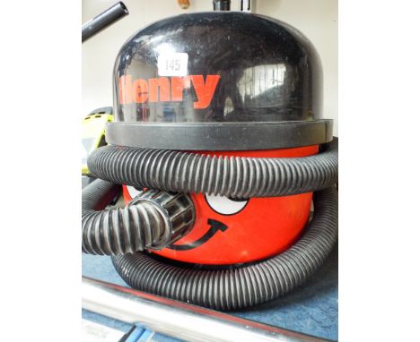 A Henry Hoover with tools but no brush 