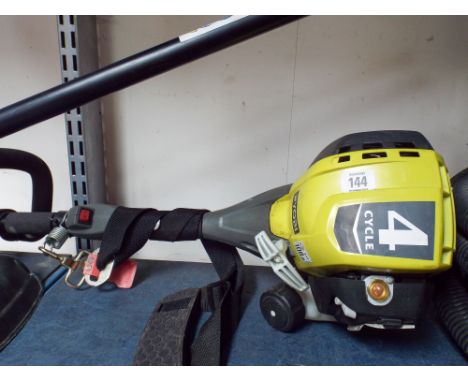 A Ryobi petrol engine strimmer 