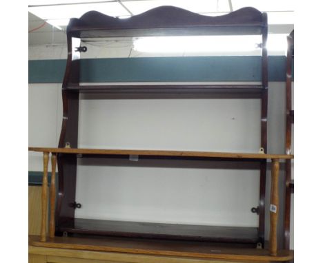 A mahogany wall fixing shelf and a small light oak two tier shelf 