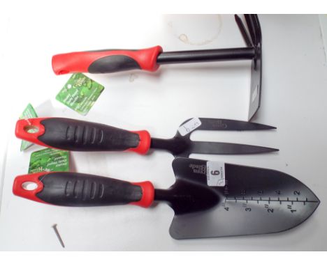 A heavy duty hand fork, hand trowel and weeder 
