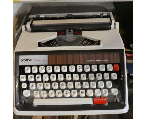 A Vintage Brother Deluxe 1350 Manual Portable Typewriter in Case
