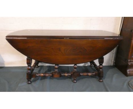 An Ercol Oval Topped Drop Legged Coffee Table, 103cm Long