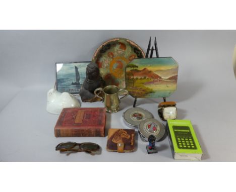 A Tray of Curios to Include Two Metal Tape Measures, Carved Wooden Bust, Robertson Golly Band Member, Alarm Clock, Oil Painti