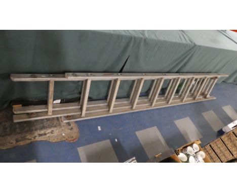 A Aluminum Triple Extending Ladder by Elkron