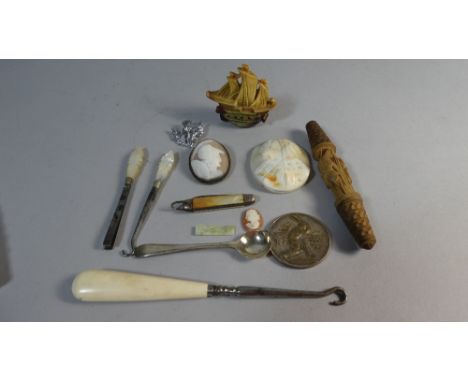 A Tray of Curios to Include Carved Cameo Shells, Galleon Ornament, Button Hook and Pen Knife 