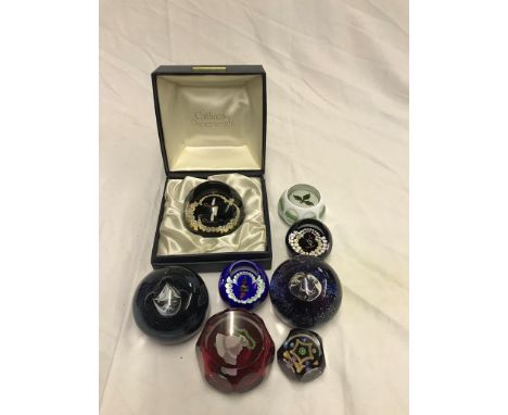 A quantity of paperweights to inc a boxed Caithness Limited Edition 'Christmas Candle'; together with other Caithness and Per