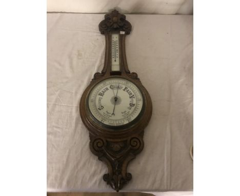 An oak banjo barometer