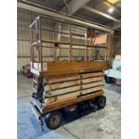 ELECTRIC SCISSOR LIFT, 7' X 32" EXTENDABLE PLATFORM, DATA TAG UNREADABLE, 750 LB LOAD CAPACITY