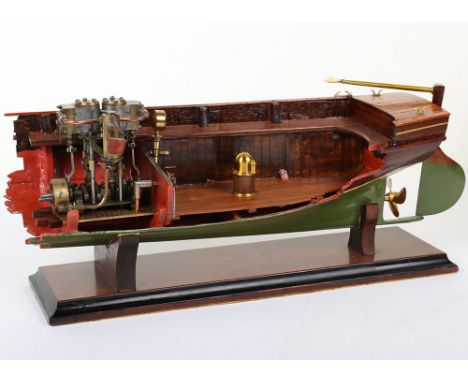 A high quality cutaway model Clinker wooden boat with twin cylinder engine, the varnished cutaway wooden boat with green pain