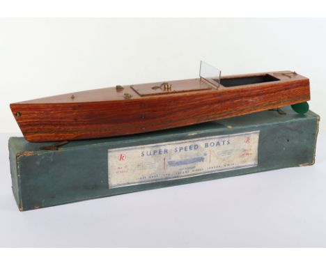 A boxed Kellner for Tri-ang clockwork No.4 Super Speed boat, circa 1935, stained mahogany hull and decks with red and green l