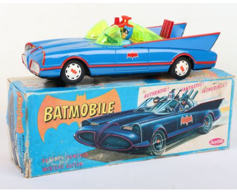 Boxed Aoshin battery operated tinplate Batmobile, Japanese 1972, the blue Batmobile with red lining, Batman and Robin figures