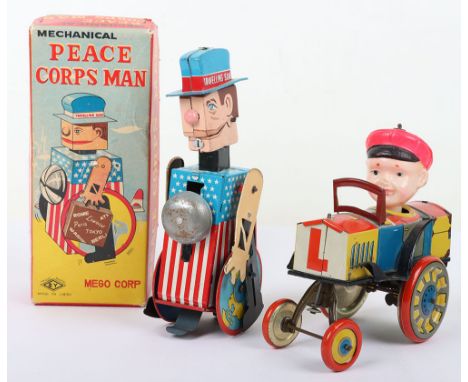 Boxed SY Toys mechanical tinplate Peace Corps Man, Travelling Sam, Japanese 1960s, brightly lithographed figure with bell to 