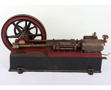 A large horizontal single cylinder steam engine, cast engine with 2” bore x 4 ¾” stoke cylinder with side mounted valve chest