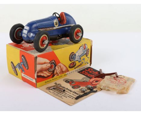 Schuco Studio 1050 Tinplate Mercedes Racing Car, original dark blue body ‘The Steering Driving-School Car, with leaflet, tool