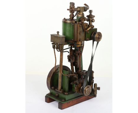 A single cylinder vertical steam engine, the cast steel and brass engine with 2” bore x 2 ¼” stroke cylinder with top mounted