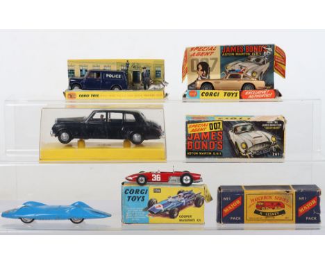 Corgi Toys 261 James Bond Aston Martin D.B.5 from the Film “Goldfinger” gold body, with working ejector seat, with bandit fig