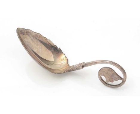A Victorian silver caddy spoon, with a leaf bowl engraved on the underside, and a curled wire stem terminating in a fish-tail