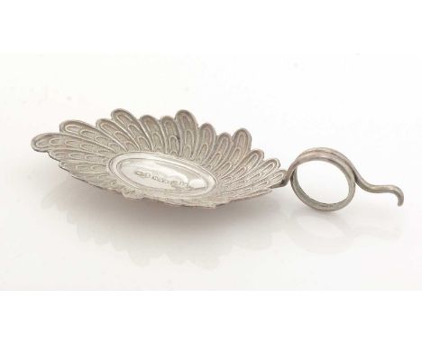 A George III silver caddy spoon, with a tendril handle and a bowl stamped to resemble radiating feather-like fluting with a p